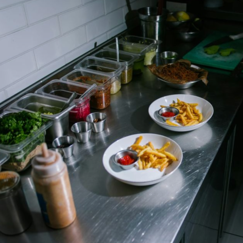 Стол производственный из нержавеющей стали 1200х700 с бортом